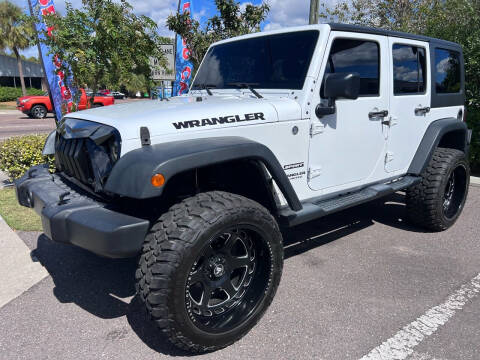 2015 Jeep Wrangler Unlimited for sale at Bay City Autosales in Tampa FL