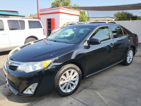 2014 Toyota Camry for sale at Auto Emporium in Wilmington CA