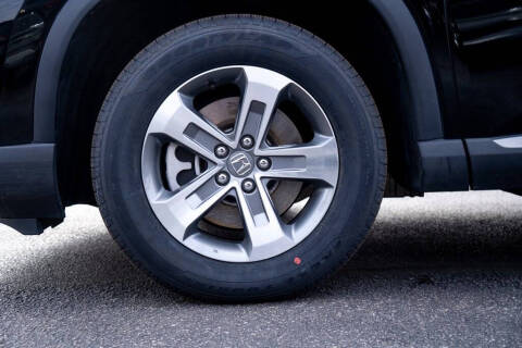 2023 Honda Pilot EX-L w/Rear Captain's Chairs