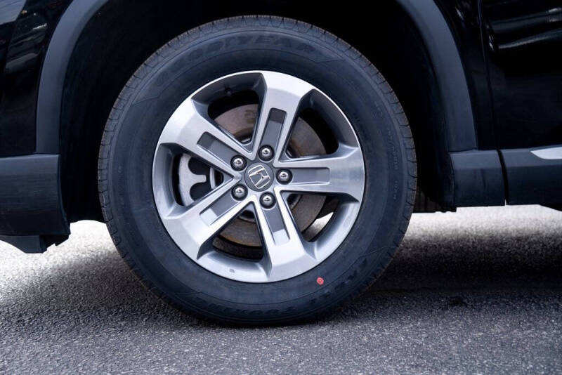 2023 Honda Pilot EX-L w/Rear Captain's Chairs