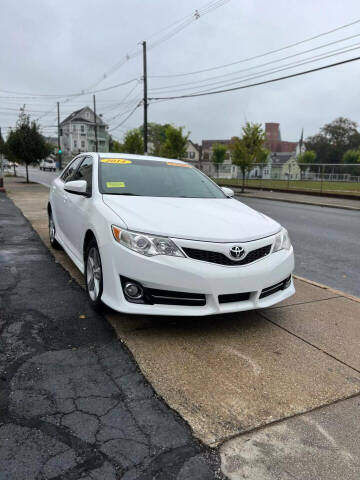 2014 Toyota Camry for sale at A & J AUTO GROUP in New Bedford MA