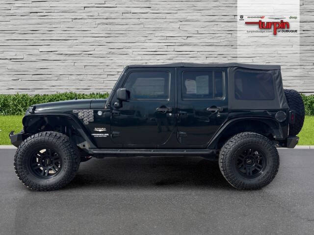 Used 2012 Jeep Wrangler Unlimited Sahara with VIN 1C4BJWEG8CL257277 for sale in Dubuque, IA