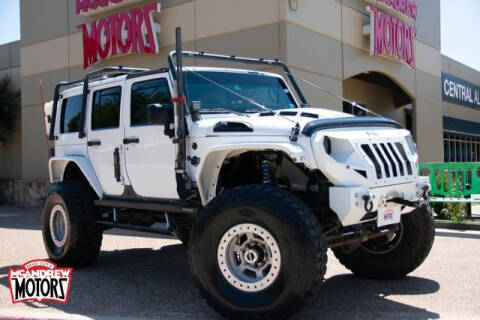2012 Jeep Wrangler Unlimited for sale at Mcandrew Motors in Arlington TX