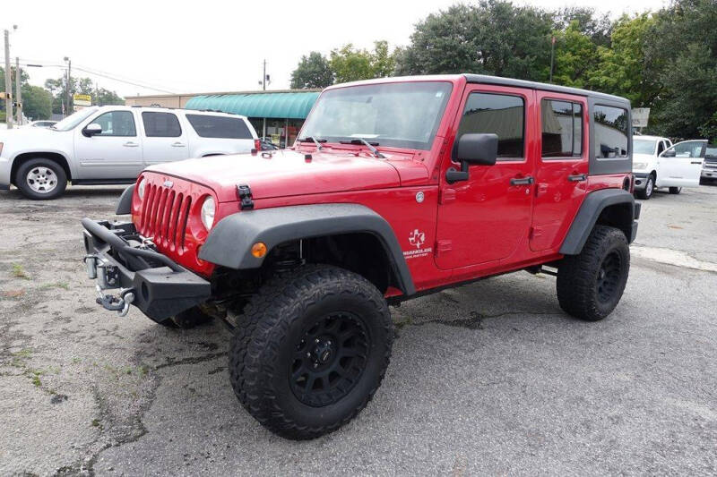 2011 Jeep Wrangler Unlimited for sale at Womack Auto Sales in Statesboro GA
