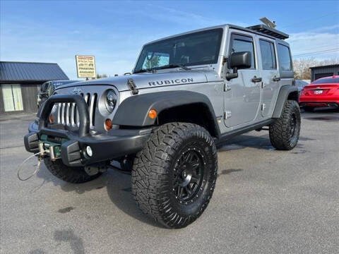 2013 Jeep Wrangler Unlimited for sale at HUFF AUTO GROUP in Jackson MI