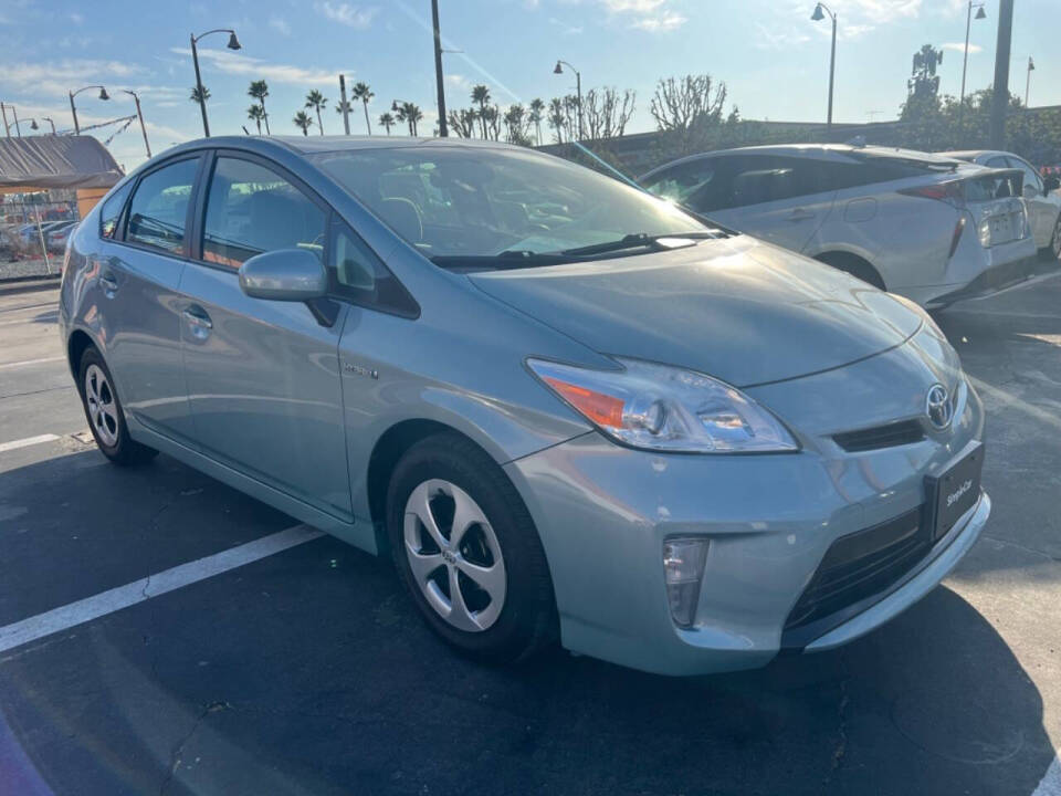 2012 Toyota Prius for sale at Unique Auto Sales, Inc. in Bell, CA