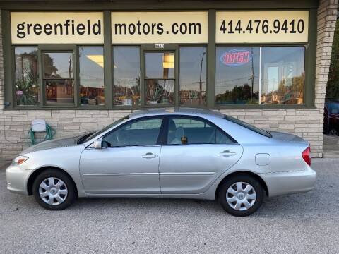 2003 Toyota Camry for sale at GREENFIELD MOTORS in Milwaukee WI