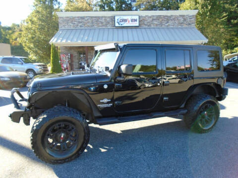 2014 Jeep Wrangler Unlimited for sale at Driven Pre-Owned in Lenoir NC