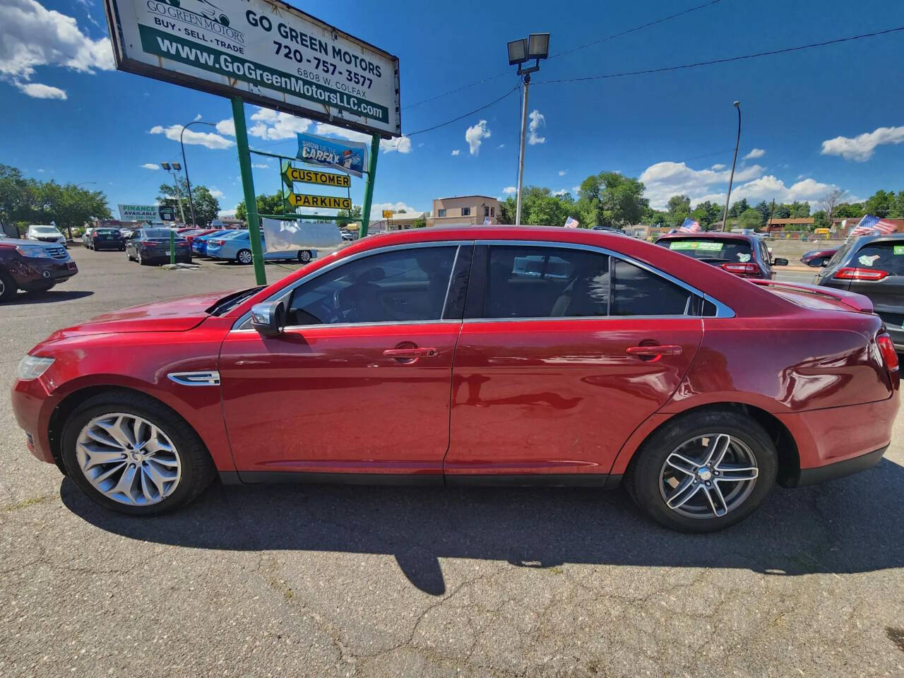 2013 Ford Taurus for sale at GO GREEN MOTORS in Lakewood, CO