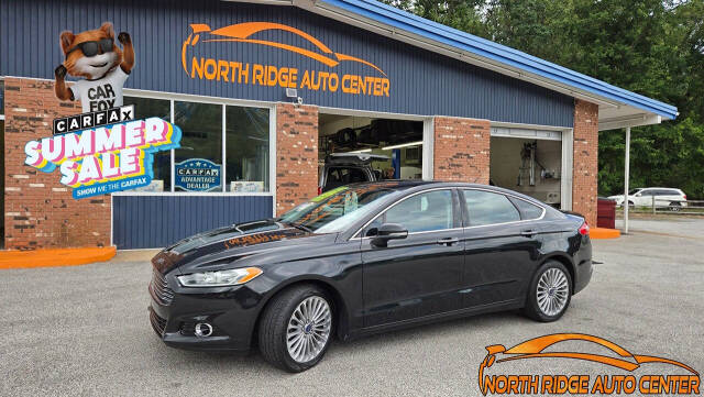 2014 Ford Fusion for sale at North Ridge Auto Center LLC in Madison, OH