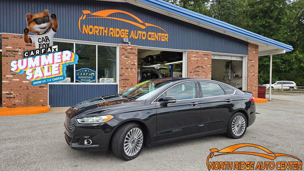 2014 Ford Fusion for sale at North Ridge Auto Center LLC in Madison, OH