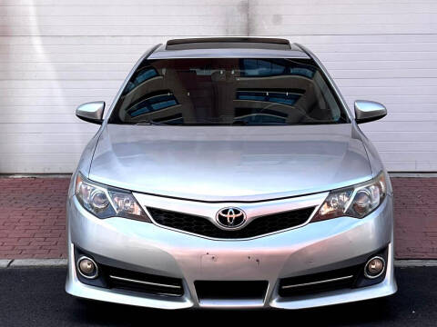 2013 Toyota Camry for sale at King Of Kings Used Cars in North Bergen NJ