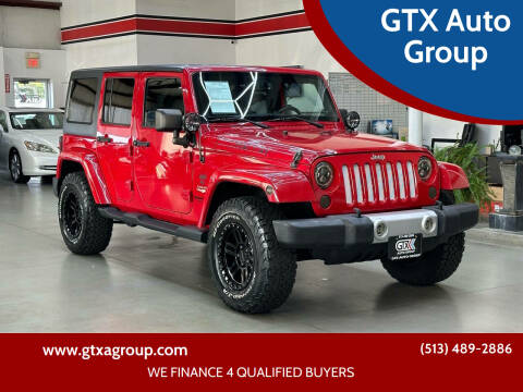 2014 Jeep Wrangler Unlimited for sale at GTX Auto Group in West Chester OH