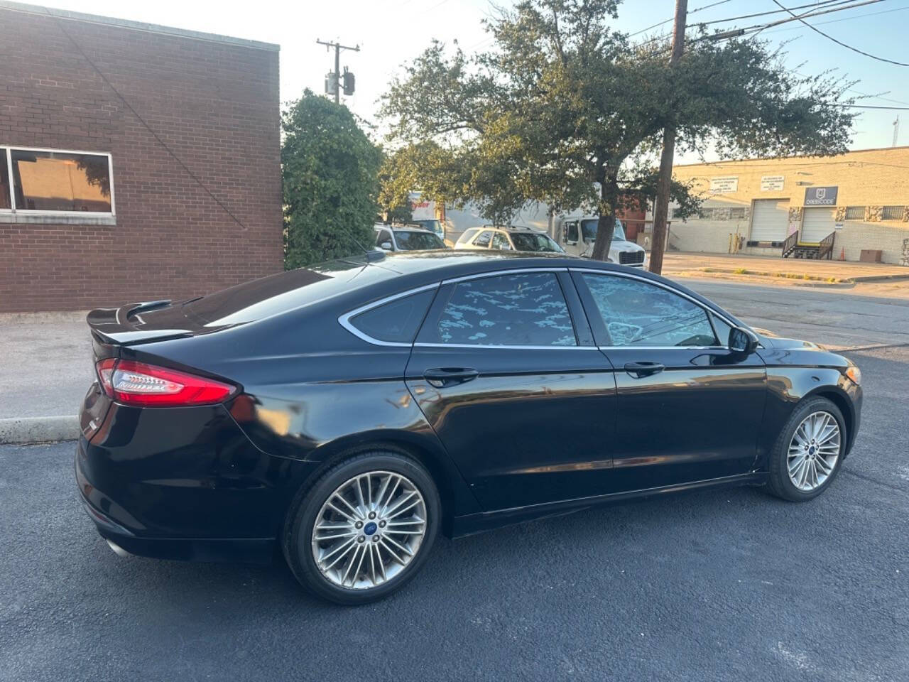 2016 Ford Fusion for sale at Sarenco Auto Inc in Dallas, TX