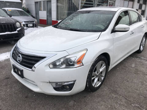 2013 Nissan Altima for sale at HIDALGOS AUTO SALES in Omaha NE