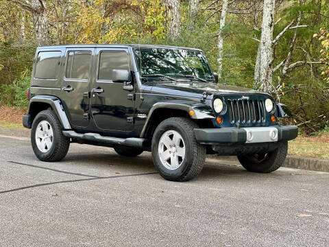 2011 Jeep Wrangler Unlimited for sale at H and S Auto Group in Canton GA