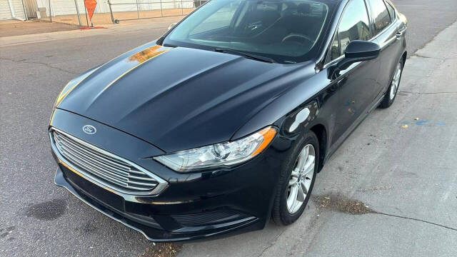 2018 Ford Fusion for sale at Ganda Auto Sales in Denver, CO