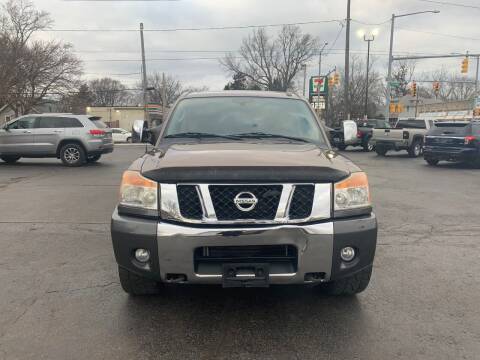 2011 Nissan Titan for sale at DTH FINANCE LLC in Toledo OH