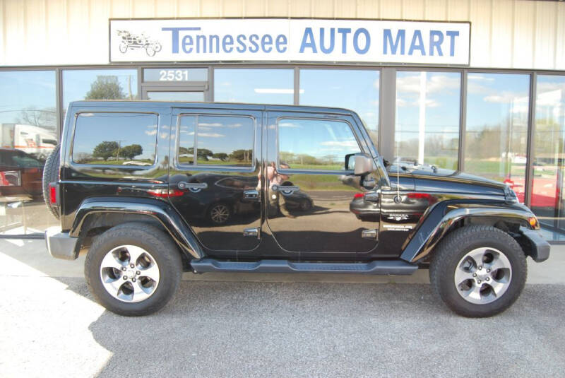 2016 Jeep Wrangler Unlimited for sale at Tennessee Auto Mart Columbia in Columbia TN