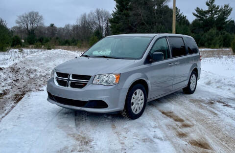 2016 Dodge Grand Caravan for sale at Hammer Auto LLC in Stanwood MI