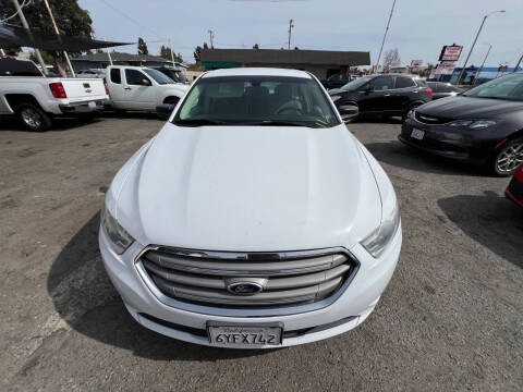 2013 Ford Taurus for sale at LR AUTO INC in Santa Ana CA
