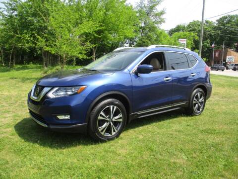 2017 Nissan Rogue for sale at Triangle Auto Sales in Elgin IL