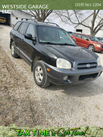 2005 Hyundai Santa Fe for sale at WESTSIDE GARAGE LLC in Keokuk IA