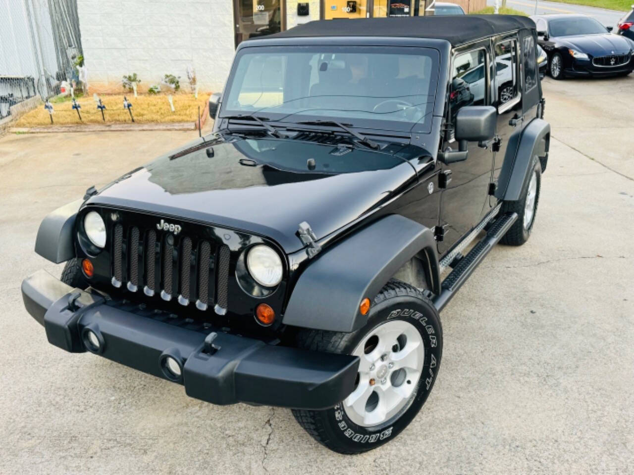 2012 Jeep Wrangler Unlimited for sale at AUTO LUX INC in Marietta, GA