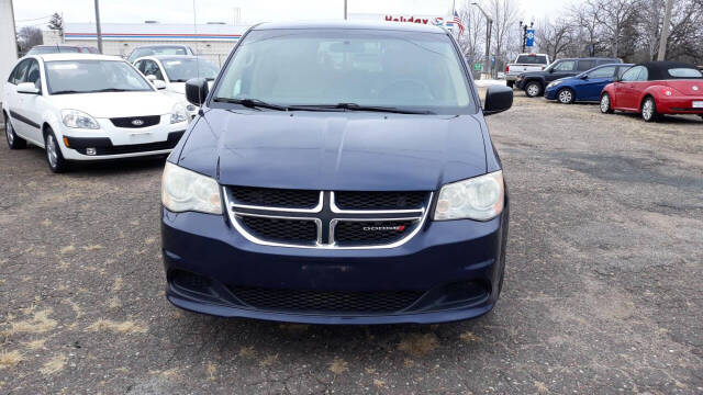 2014 Dodge Grand Caravan for sale at CHRISTIAN AUTO SALES in Anoka, MN