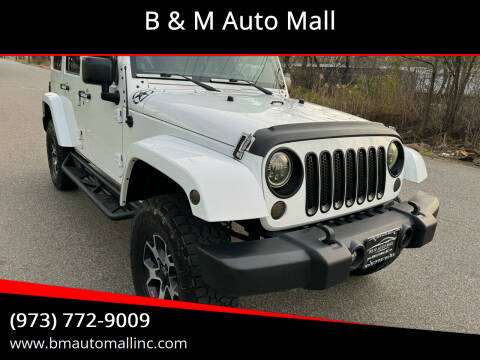 2013 Jeep Wrangler Unlimited for sale at B & M Auto Mall in Clifton NJ