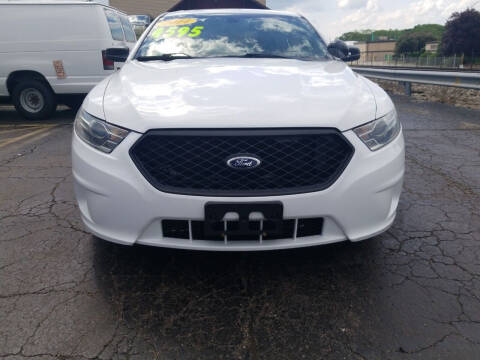 2014 Ford Taurus for sale at Discovery Auto Sales in New Lenox IL