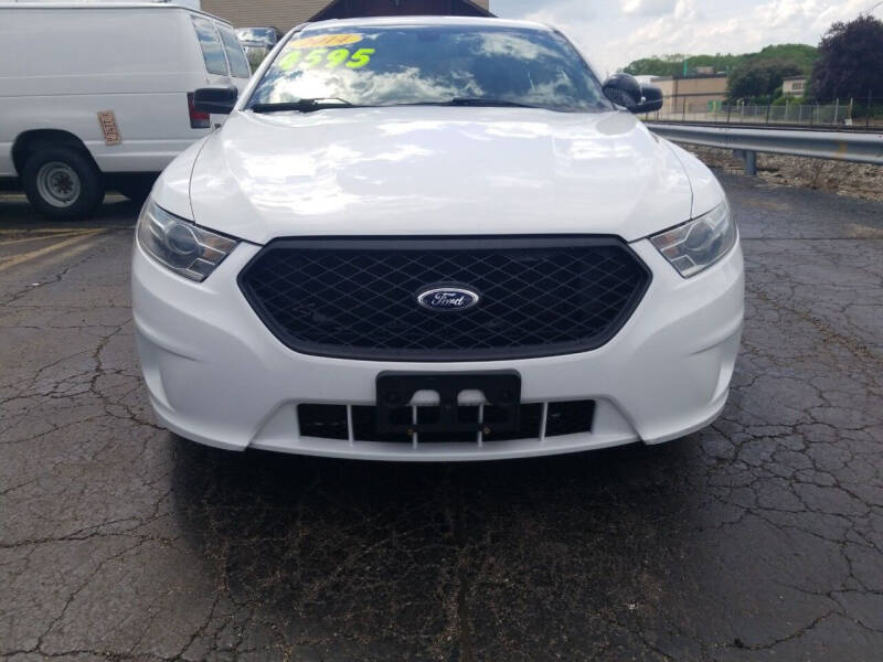 2014 Ford Taurus for sale at Discovery Auto Sales in New Lenox IL