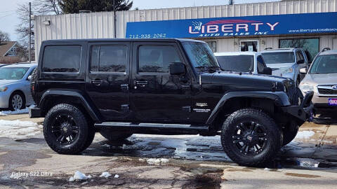 2013 Jeep Wrangler Unlimited for sale at Liberty Auto Sales in Merrill IA