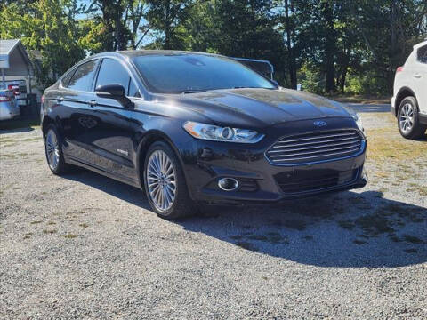 2013 Ford Fusion Hybrid for sale at Auto Mart in Kannapolis NC