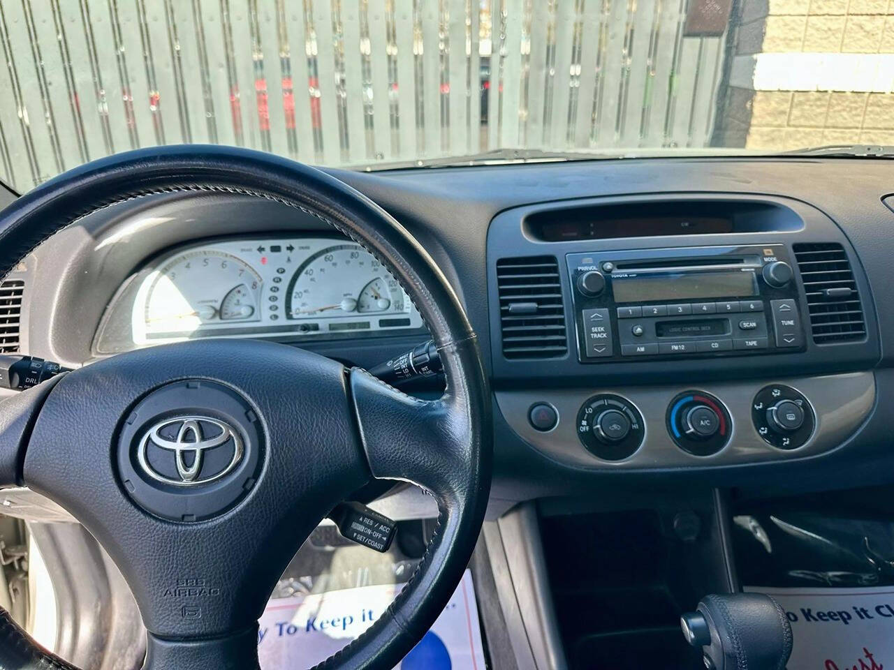 2003 Toyota Camry for sale at HUDSONS AUTOS in Gilbert, AZ