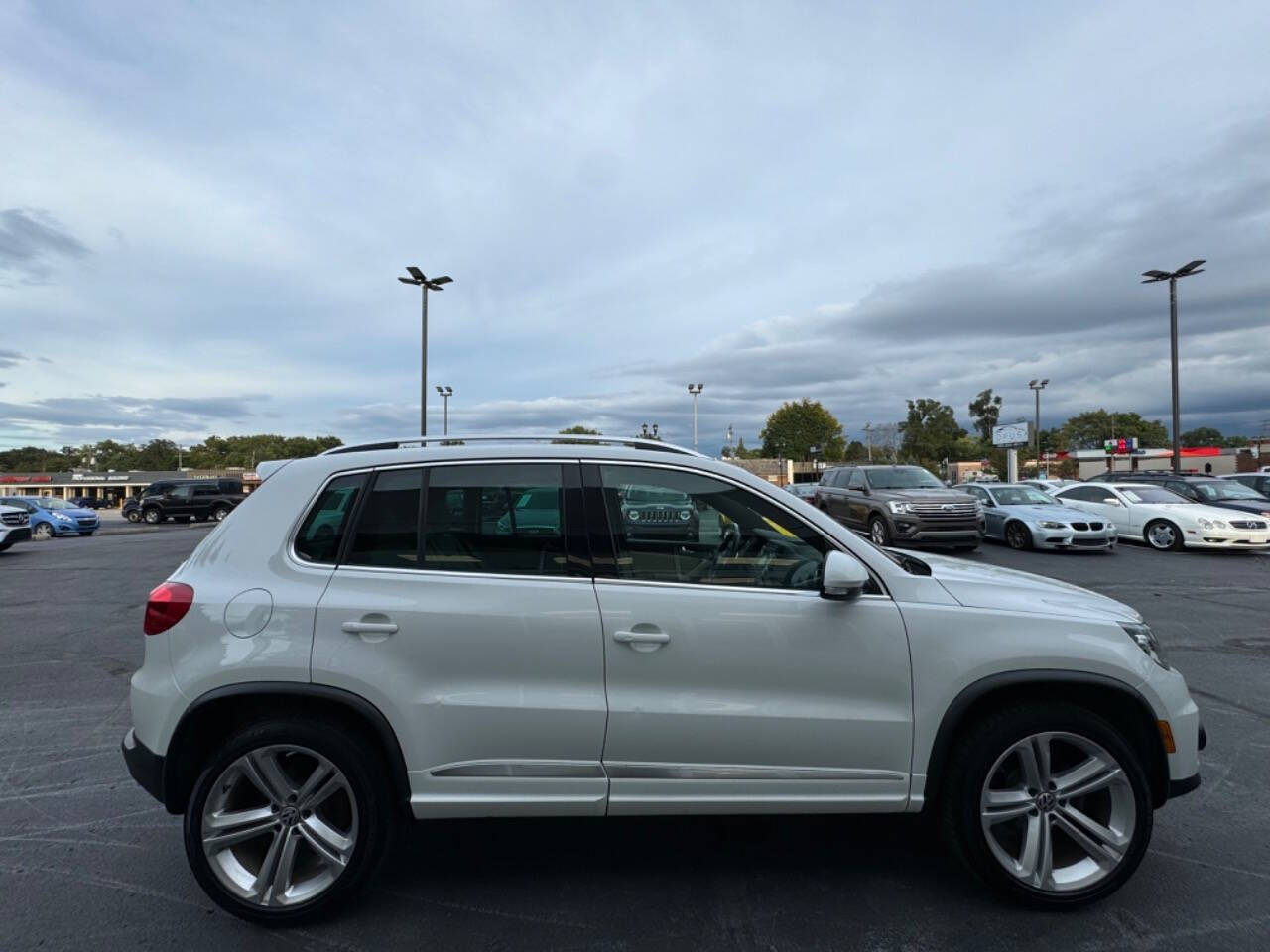 2014 Volkswagen Tiguan for sale at Opus Motorcars in Utica, MI