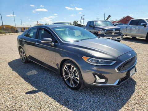 2019 Ford Fusion for sale at BERKENKOTTER MOTORS in Brighton CO