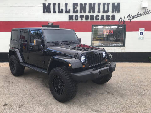 2014 Jeep Wrangler Unlimited for sale at Millennium Motorcars in Yorkville IL