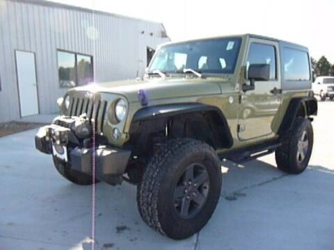 2013 Jeep Wrangler for sale at BERG AUTO MALL & TRUCKING INC in Beresford SD
