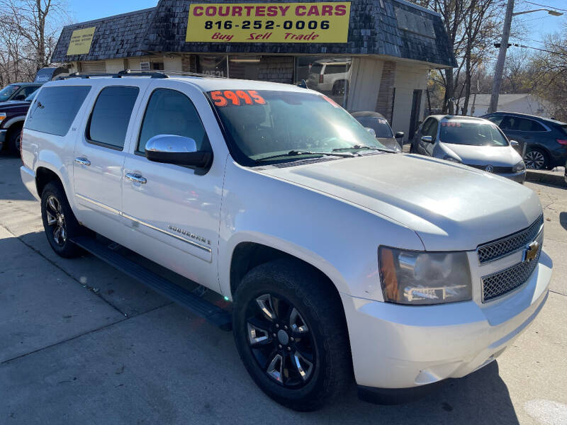 2009 Chevrolet Suburban for sale at Courtesy Cars in Independence MO