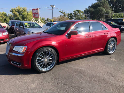 2014 Chrysler 300 for sale at C J Auto Sales in Riverbank CA