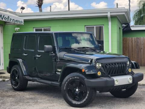 2012 Jeep Wrangler Unlimited for sale at Caesars Auto Sales in Longwood FL