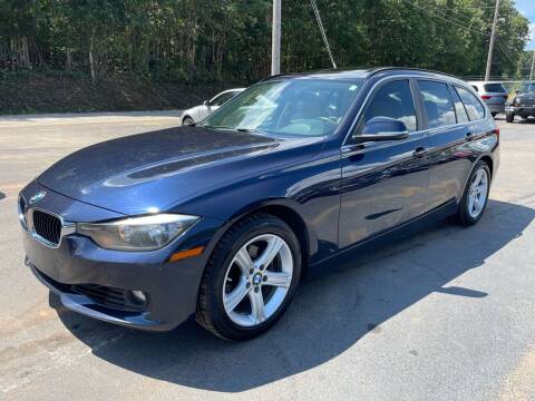 2015 BMW 3 Series for sale at GEORGIA AUTO DEALER, LLC in Buford GA