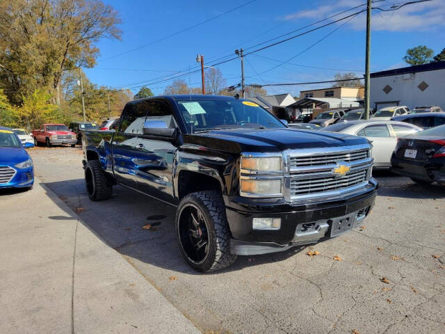 2014 Chevrolet Silverado 1500 for sale at DAGO'S AUTO SALES LLC in Dalton, GA