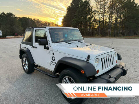 2013 Jeep Wrangler for sale at Two Brothers Auto Sales in Loganville GA