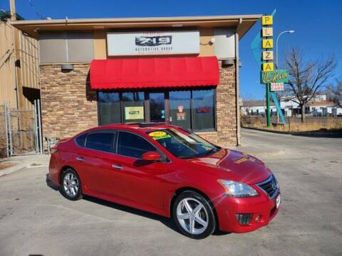 2013 Nissan Sentra for sale at 719 Automotive Group in Colorado Springs CO