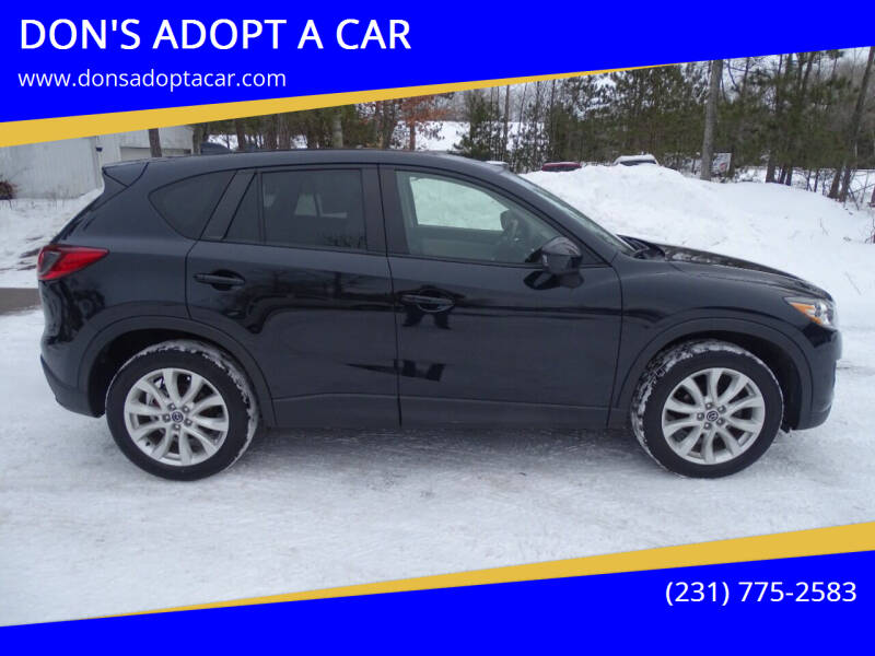 2014 Mazda CX-5 for sale at DON'S ADOPT A CAR in Cadillac MI