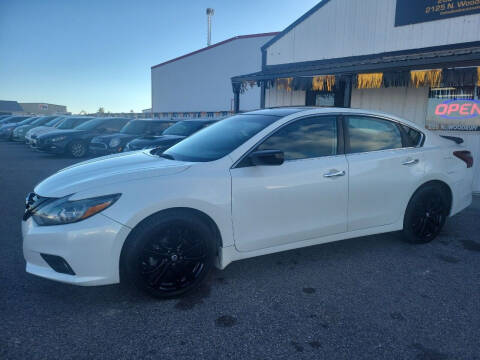 2018 Nissan Altima for sale at BELOW BOOK AUTO SALES in Idaho Falls ID