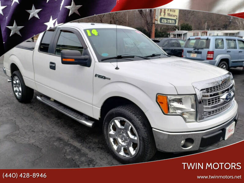 2014 Ford F-150 for sale at TWIN MOTORS in Madison OH