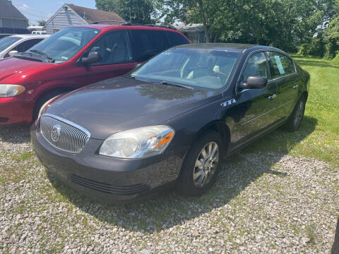 2009 Buick Lucerne for sale at HEDGES USED CARS in Carleton MI